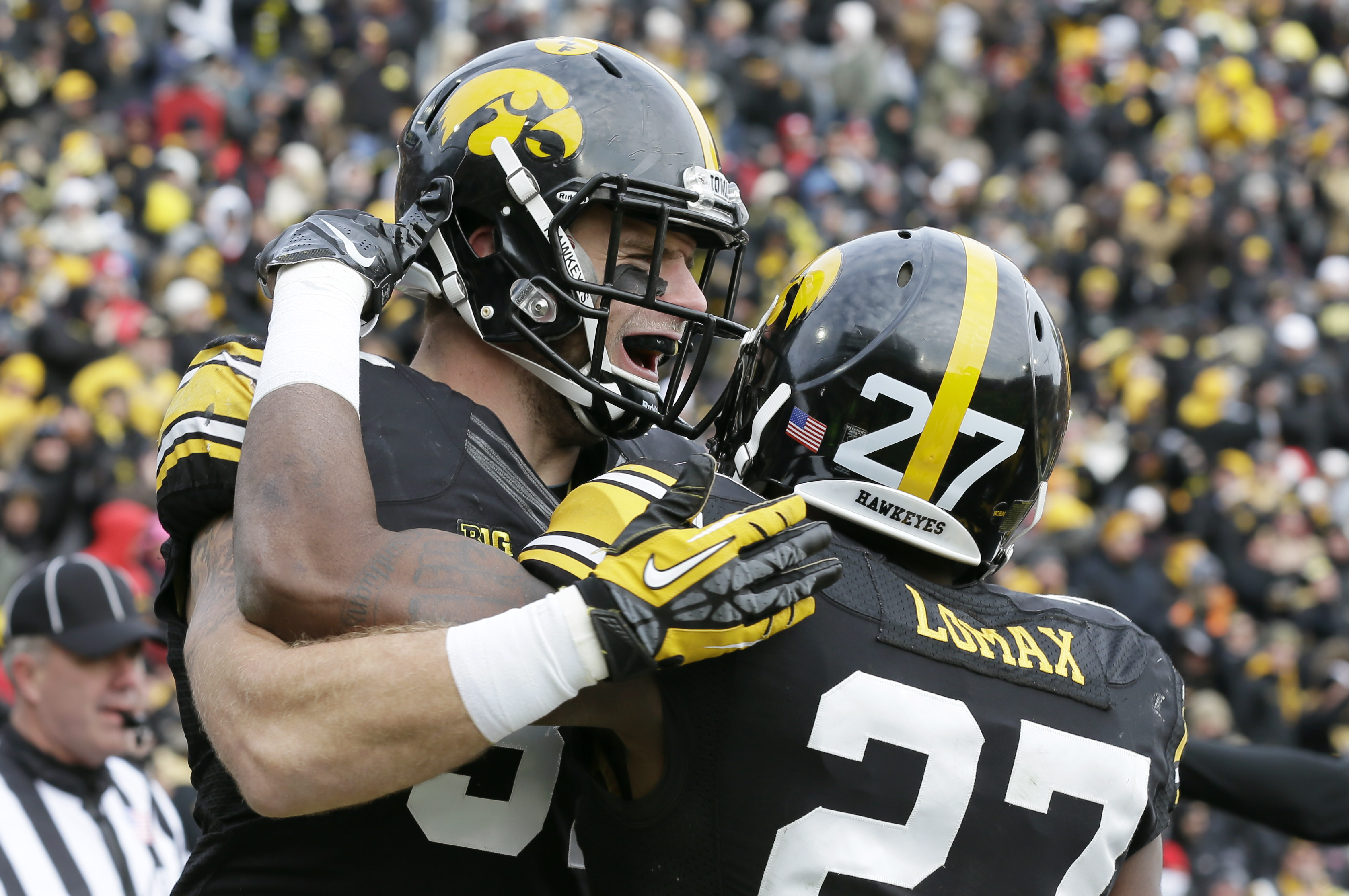 Nebraska beats Iowa 37-34 in OT