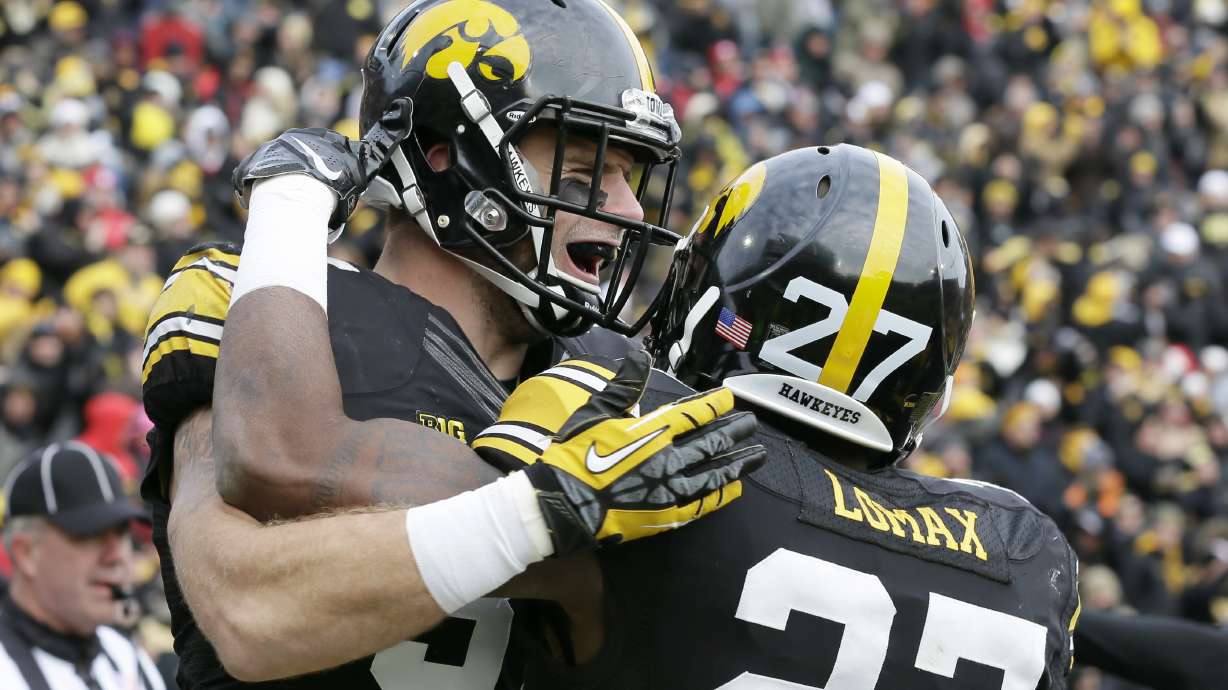 Nebraska beats Iowa 37-34 in OT