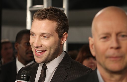 Actors Jai Courtney left, and Bruce Willis attend the "A Good Day To Die Hard" premiere at AMC Empire 25 Theatre on Wednesday, Feb. 13, 2013 in New York. (Photo by Donald Traill/Invision/AP)