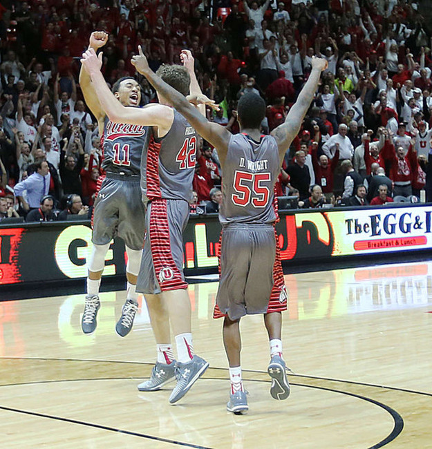 Utah Utes guard Brandon Taylor (11),Utah Utes forward Jakob Poeltl (42) and Utah Utes guard Delon Wright (55) celebrate as Utah knocks off Wichita State Thursday, Dec. 4, 2014, in the Huntsman Center at the University of Utah in Salt Lake City. Utah won 69-68. (Photo: Scott G Winterton/Deseret News)