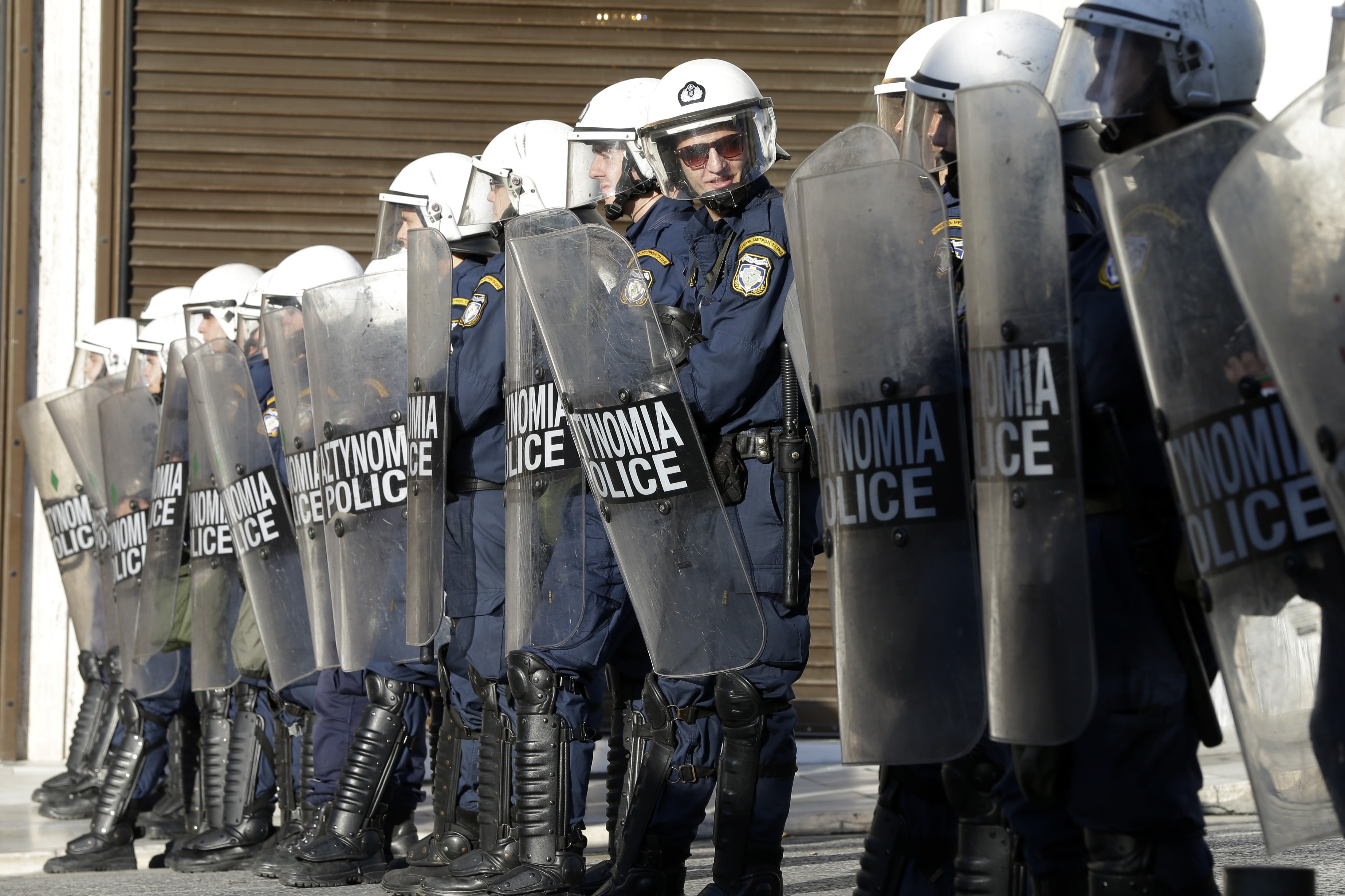 Protests turn violent in 2 Greek cities