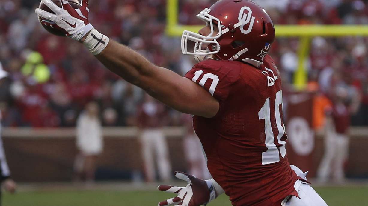 Oklahoma St beats No. 18 Oklahoma 38-35 in OT