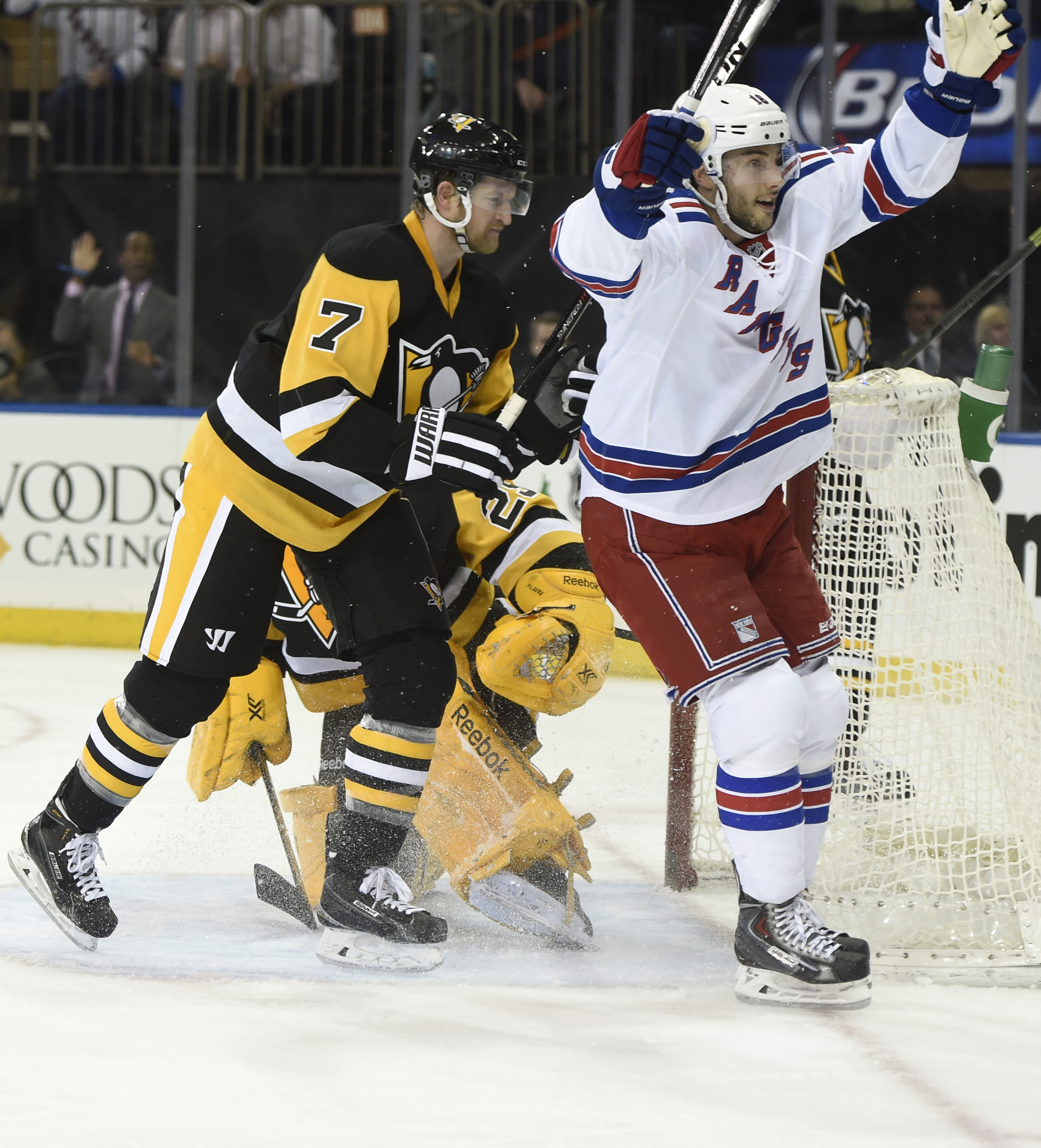 Rangers blow late lead, rebound to top Pens in OT