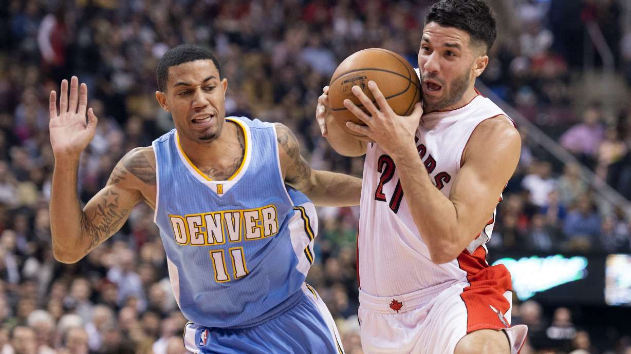 Lowry helps Raptors beat Nuggets 112-107 in OT