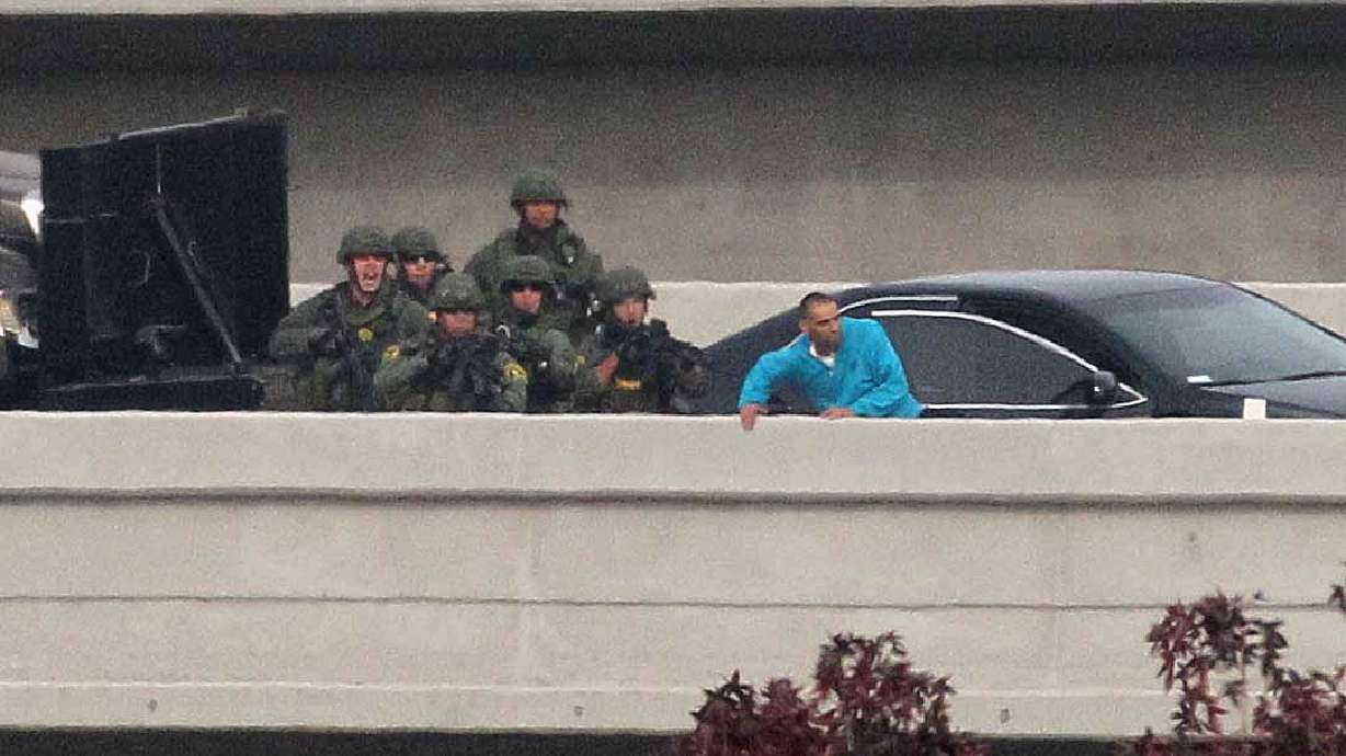 Man who fled with 4 sons arrested in wife's death