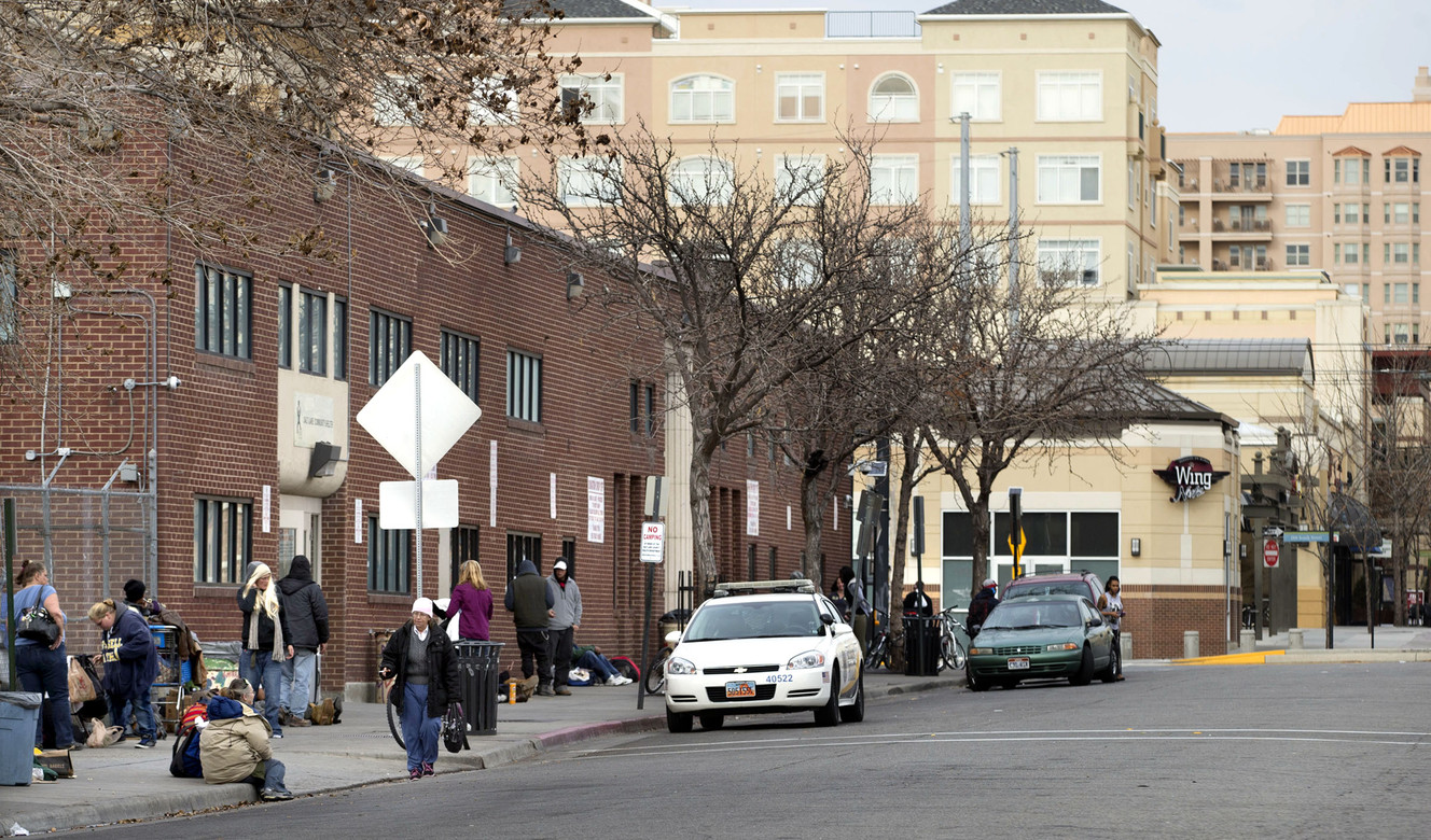 Homeless people gather outside The Road Home in Salt Lake City on Friday, Dec. 12, 2014. City officials are discussing moving the shelter. (Photo: Laura Seitz, Deseret News)