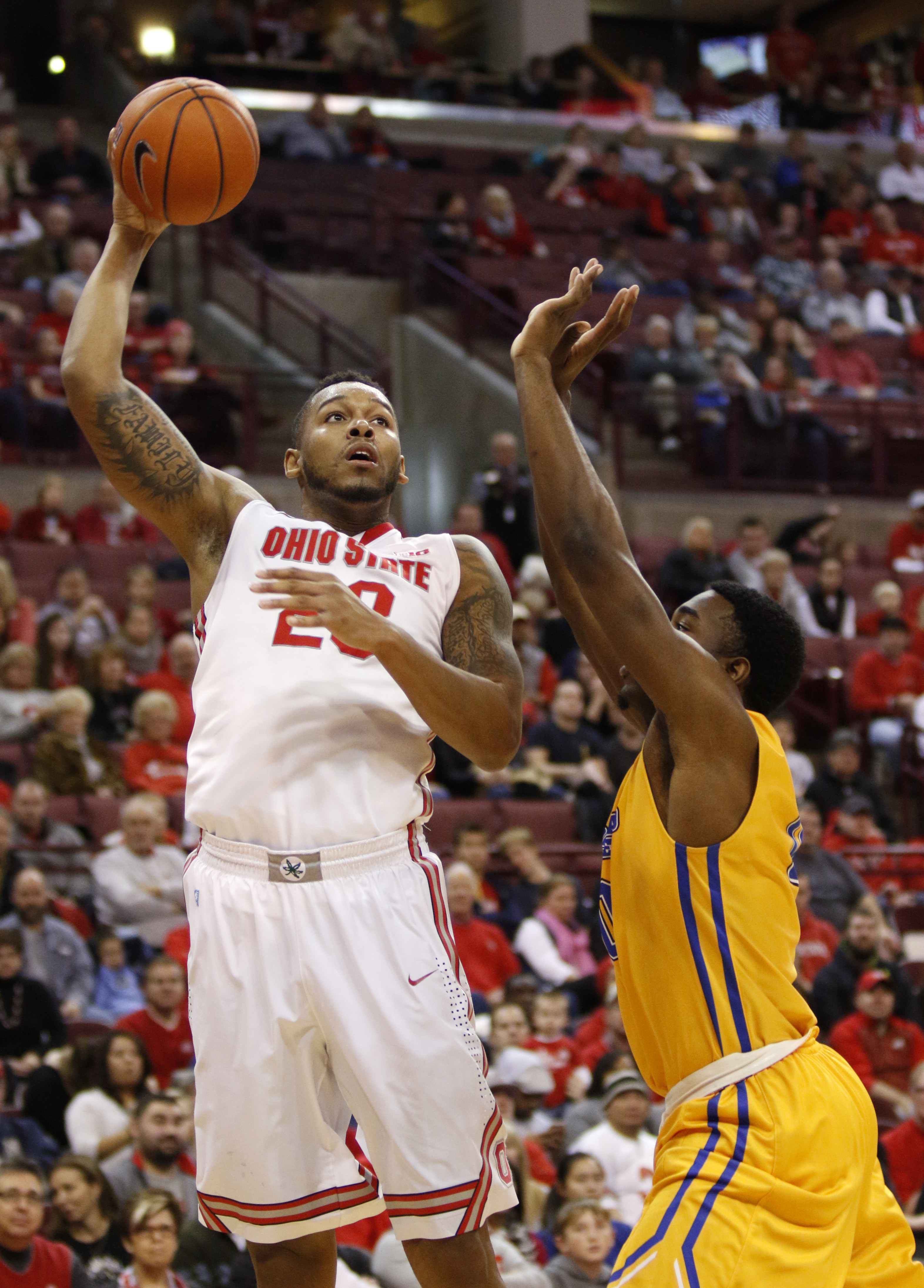 Russell, Thompson lead No. 12 Buckeyes' 87-71 win