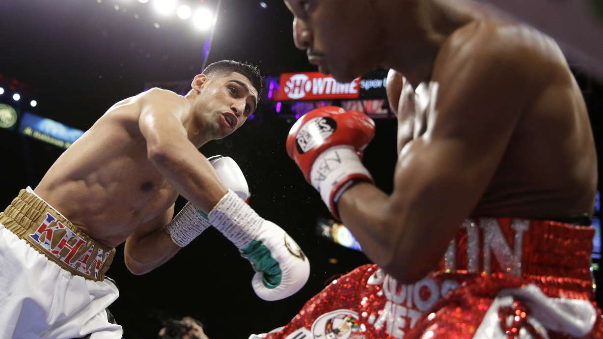 Khan wins welterweight decision over Alexander