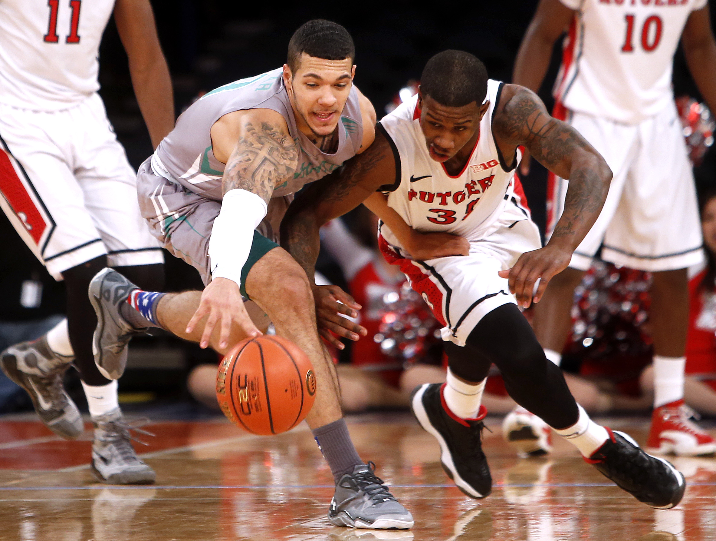 Rutgers holds off Manhattan 63-55 in Holiday Festival at MSG