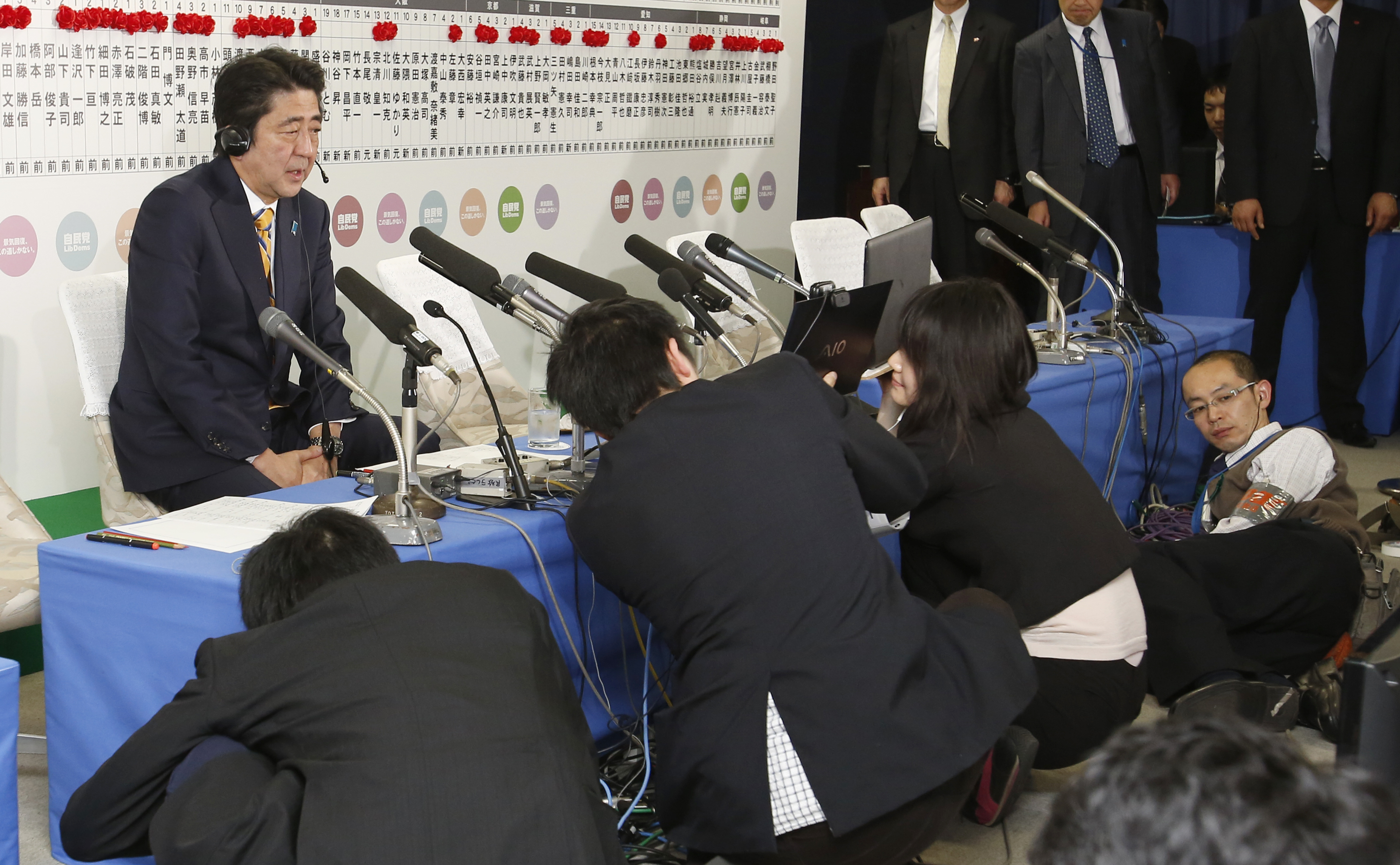 Japan's Abe faces battle on reforms despite win