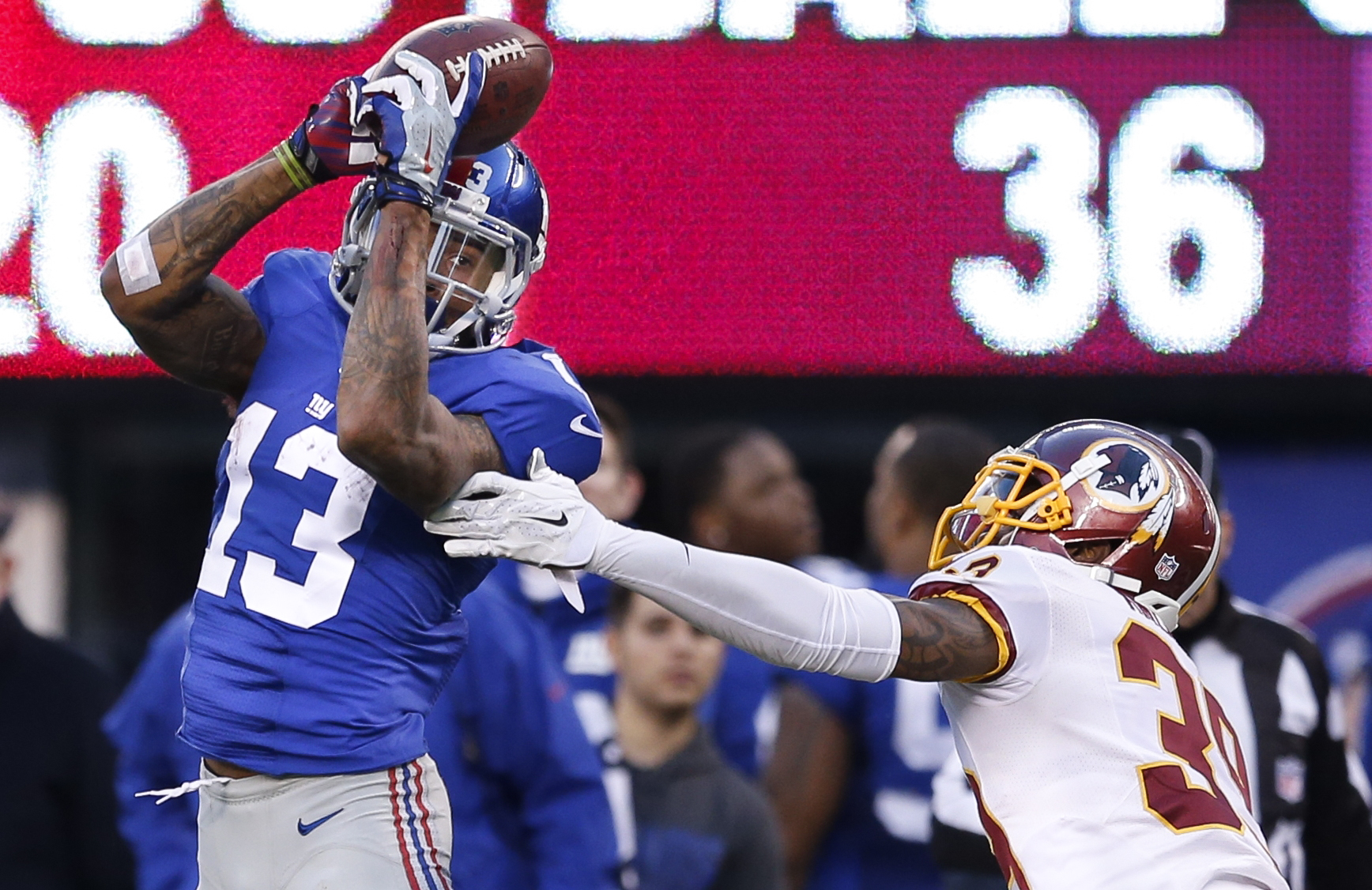 Manning hits Beckham on 3 TD passes in Giants win
