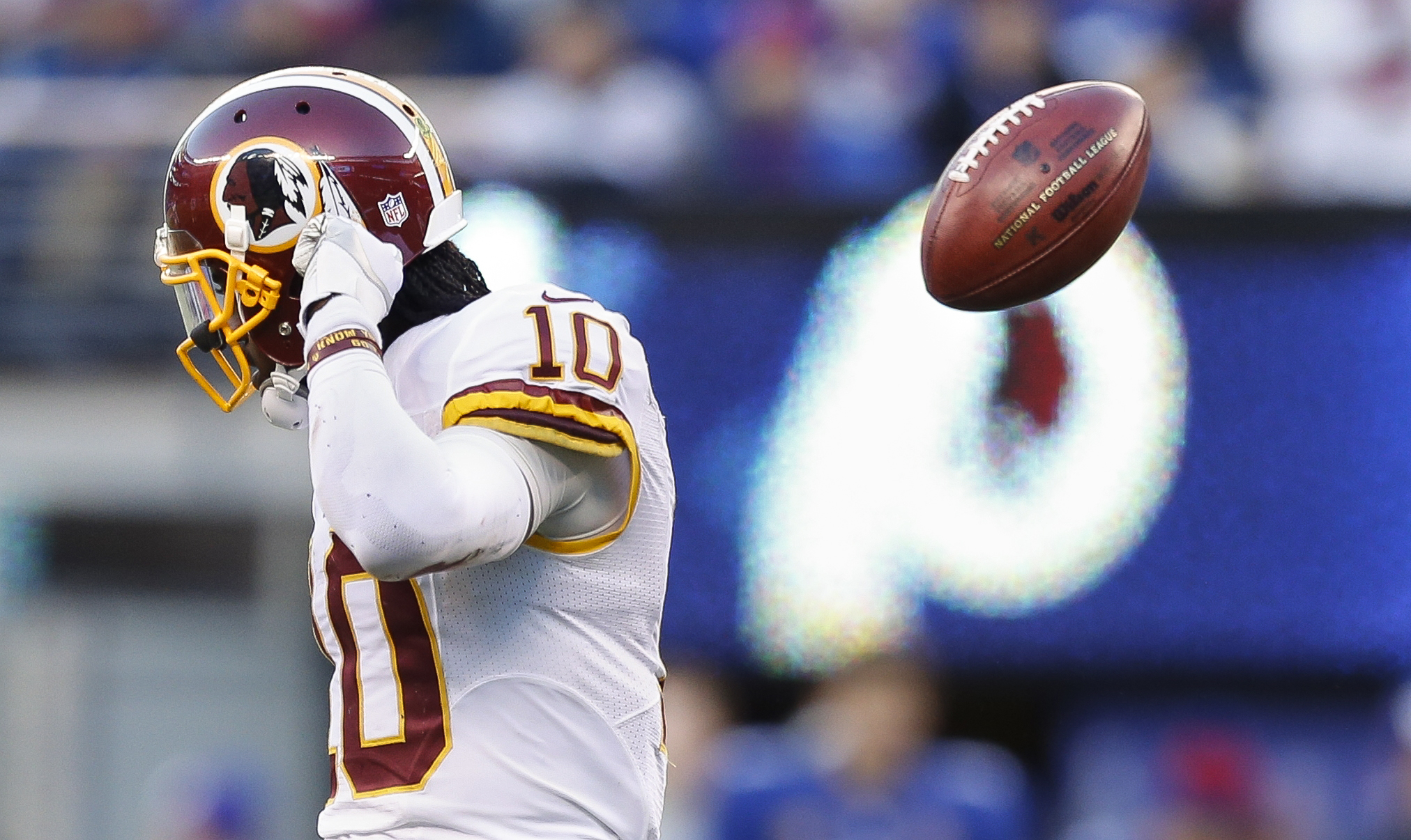 Back as Redskins starter, RG3 goes low-key