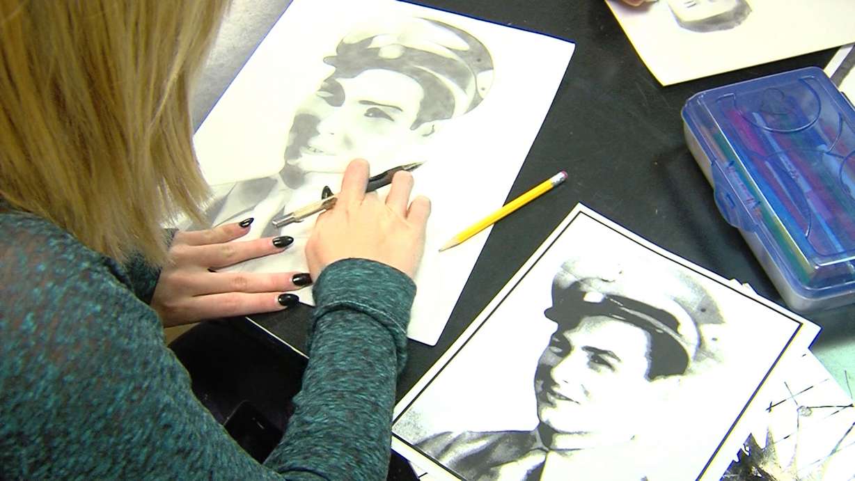 Art students at Oquirrh Hills Middle School create sketches that they will present to veterans along with their Honor Flight donations on Friday.