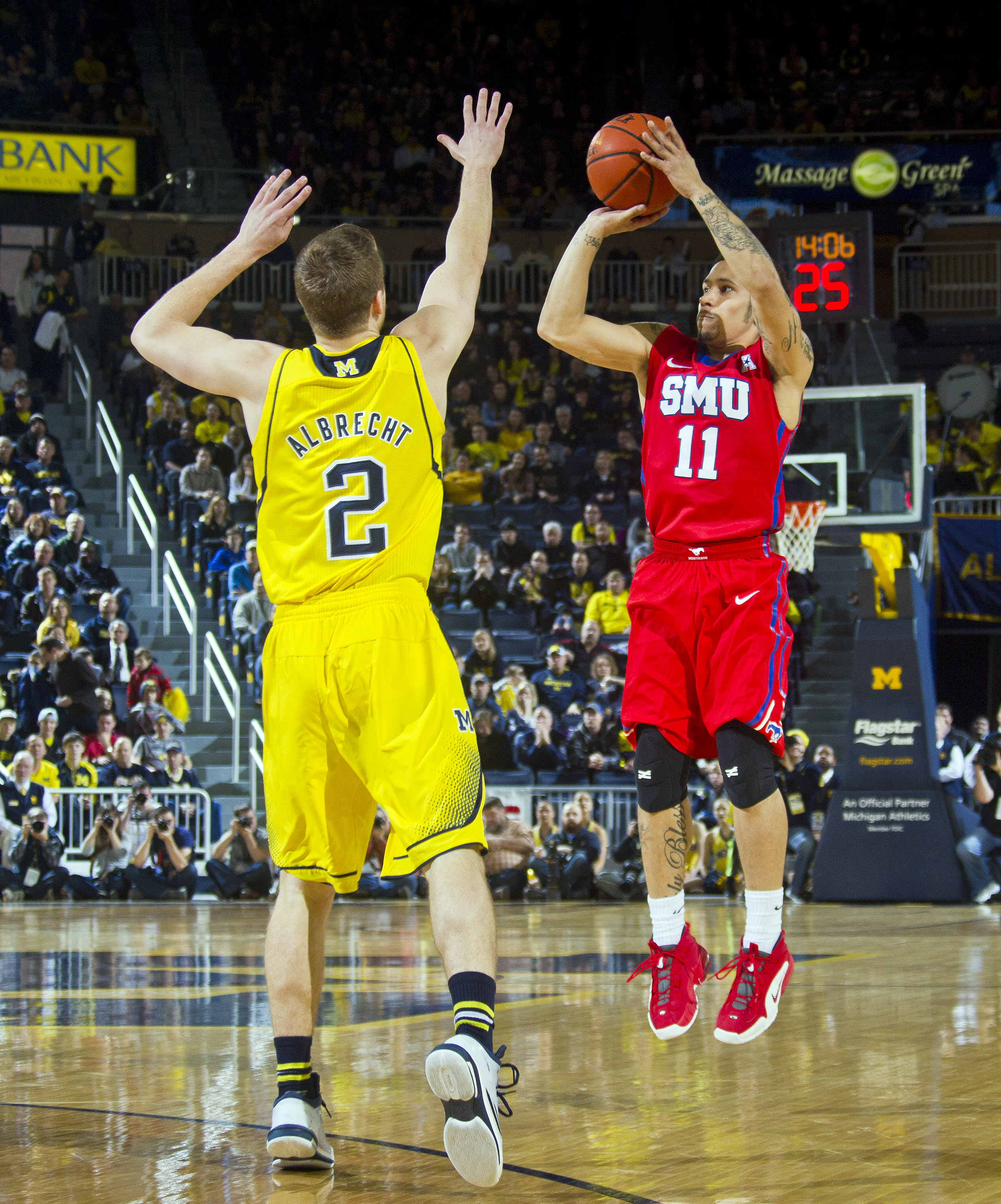 SMU keeps Michigan reeling 62-51