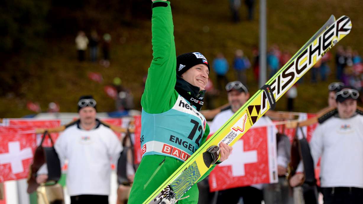 Koudelka edges Ammann for ski jump victory
