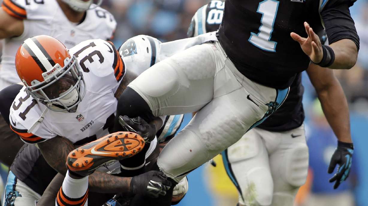 Panthers beat Browns 17-13, move into first place