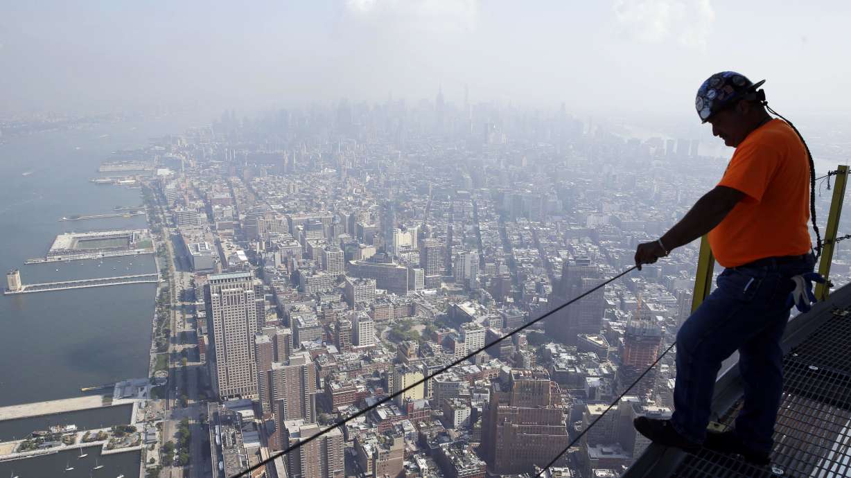 US economy accelerates and helps lift Dow to 18K