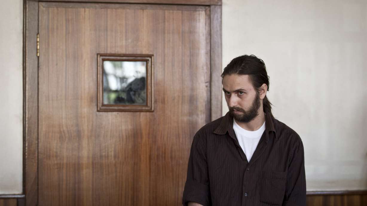 American charged in Uganda for counterfeit dollars