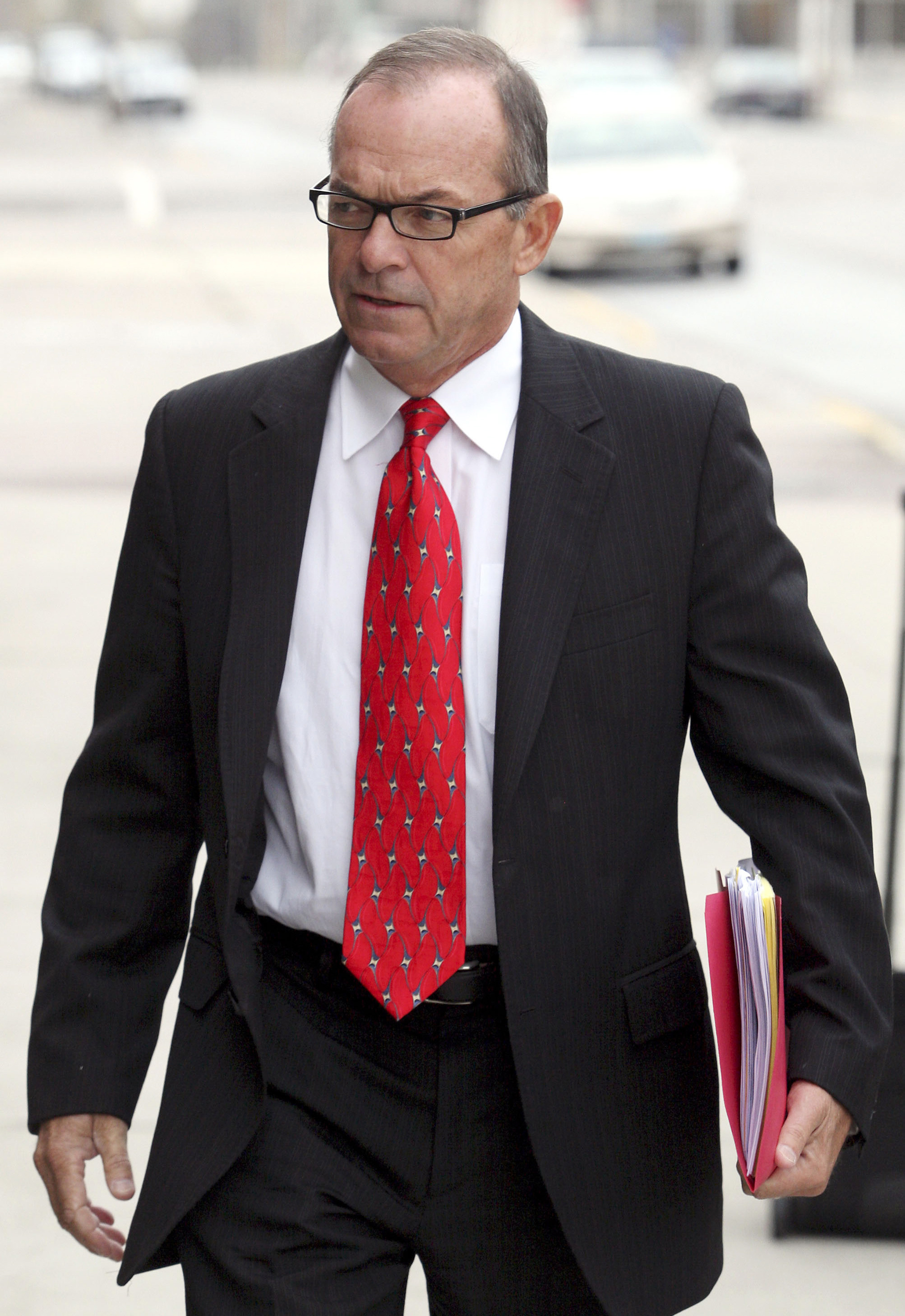 Creditors go after jailed real estate mogul's wife