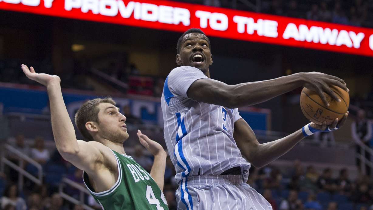 Magic use big 1st half to hold off Celtics 100-95