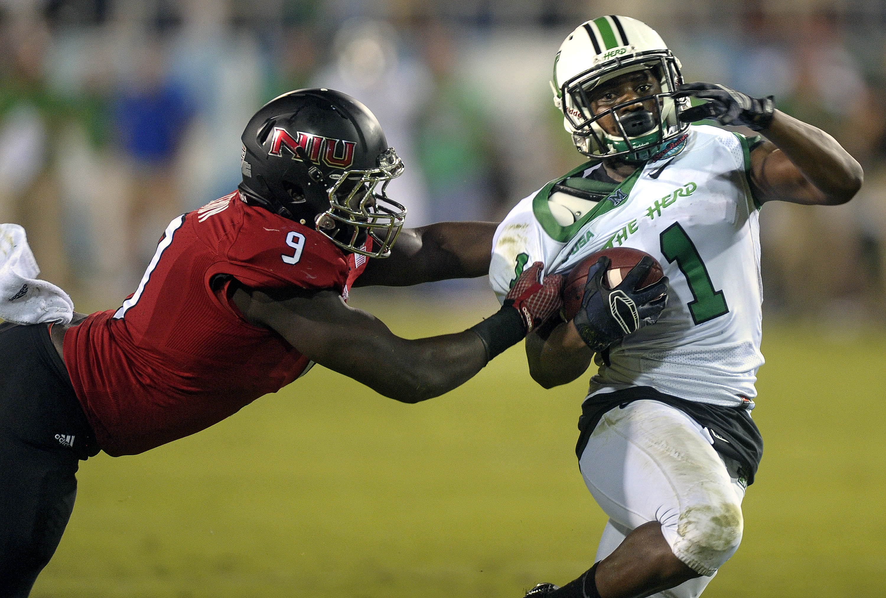 Northern Illinois loses to Marshall 52-23 in Boca Raton Bowl