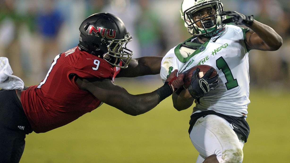 Northern Illinois loses to Marshall 52-23 in Boca Raton Bowl