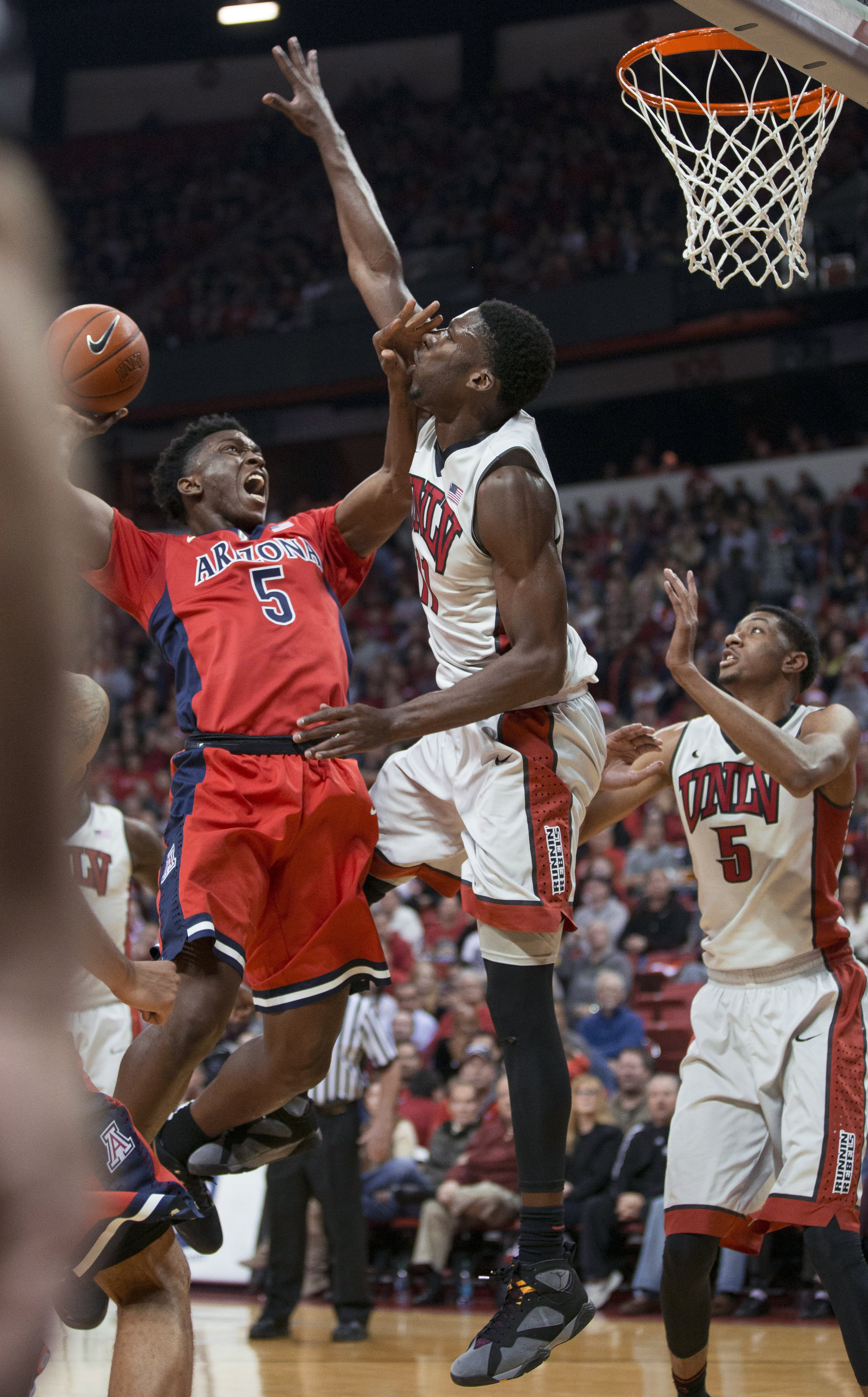 Rebels top No. 3 Wildcats 71-67