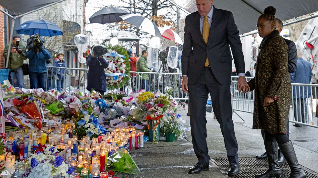 NY mayor: Protests after cops' deaths are divisive