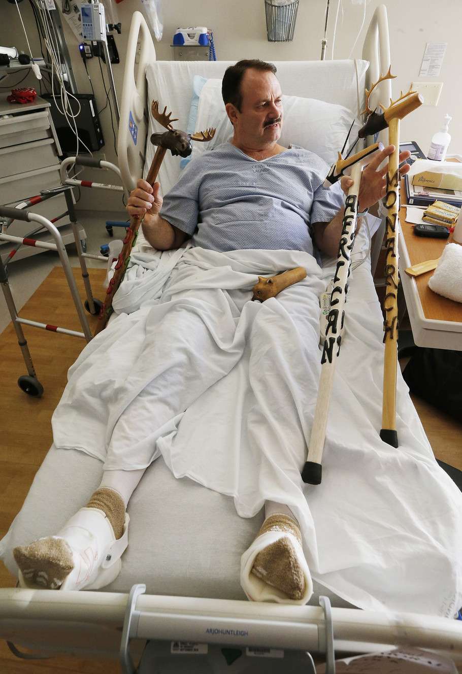 Bruce Gourley talks about his woodwork and cane making while recovering from bilateral total knee arthroplasty surgery at Riverton Hospital in Riverton on Friday, Dec. 5, 2014. (Photo: Jeffrey D. Allred, Deseret News)