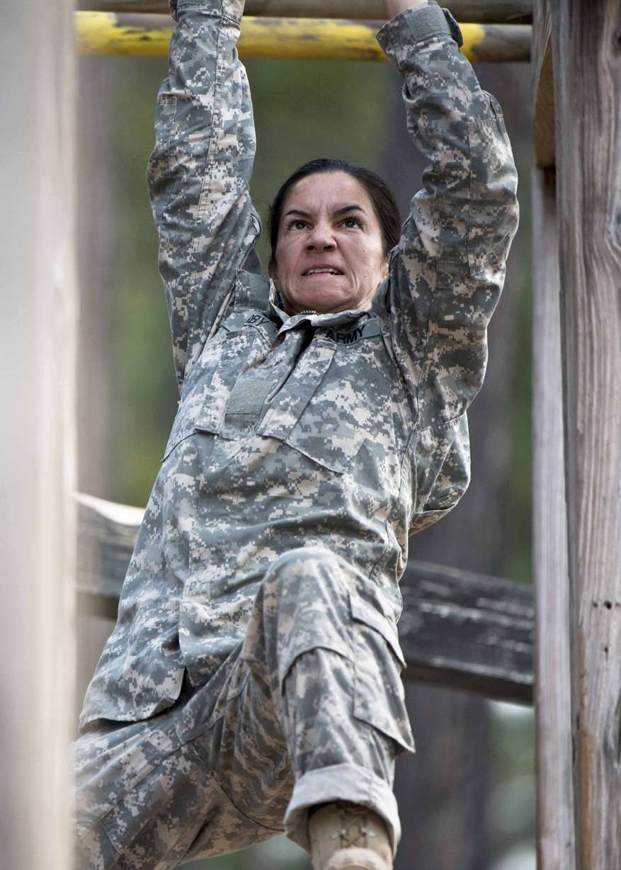 In this undated photo released by the Utah National Guard, shows 1st. Lt. Alessandra Kirby negotiating the Darby Obstacle Course at Fort Benning during the Ranger Assessment. Kirby, a Utah National Guard solider, will be among a handful of women going to the grueling Army Ranger school as part of the U.S. military's first steps toward allowing women to move into the elite combat unit. (AP Photo/US Army, Patrick A. Albright)