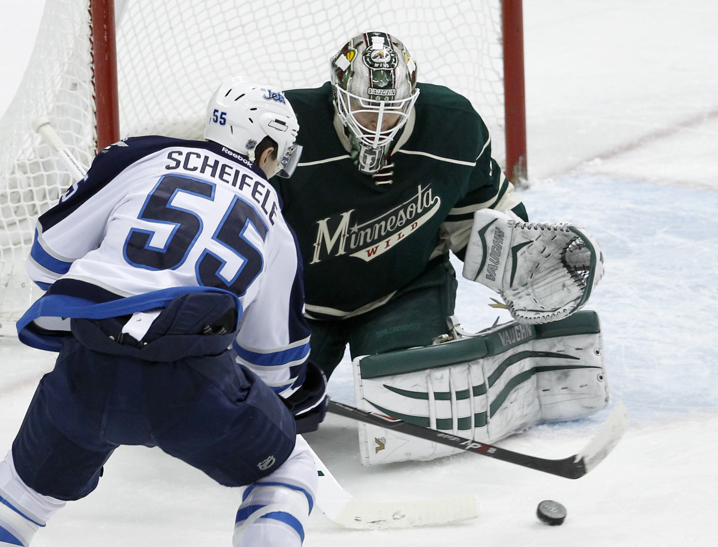 Ladd scores in OT, Jets beat Wild 4-3