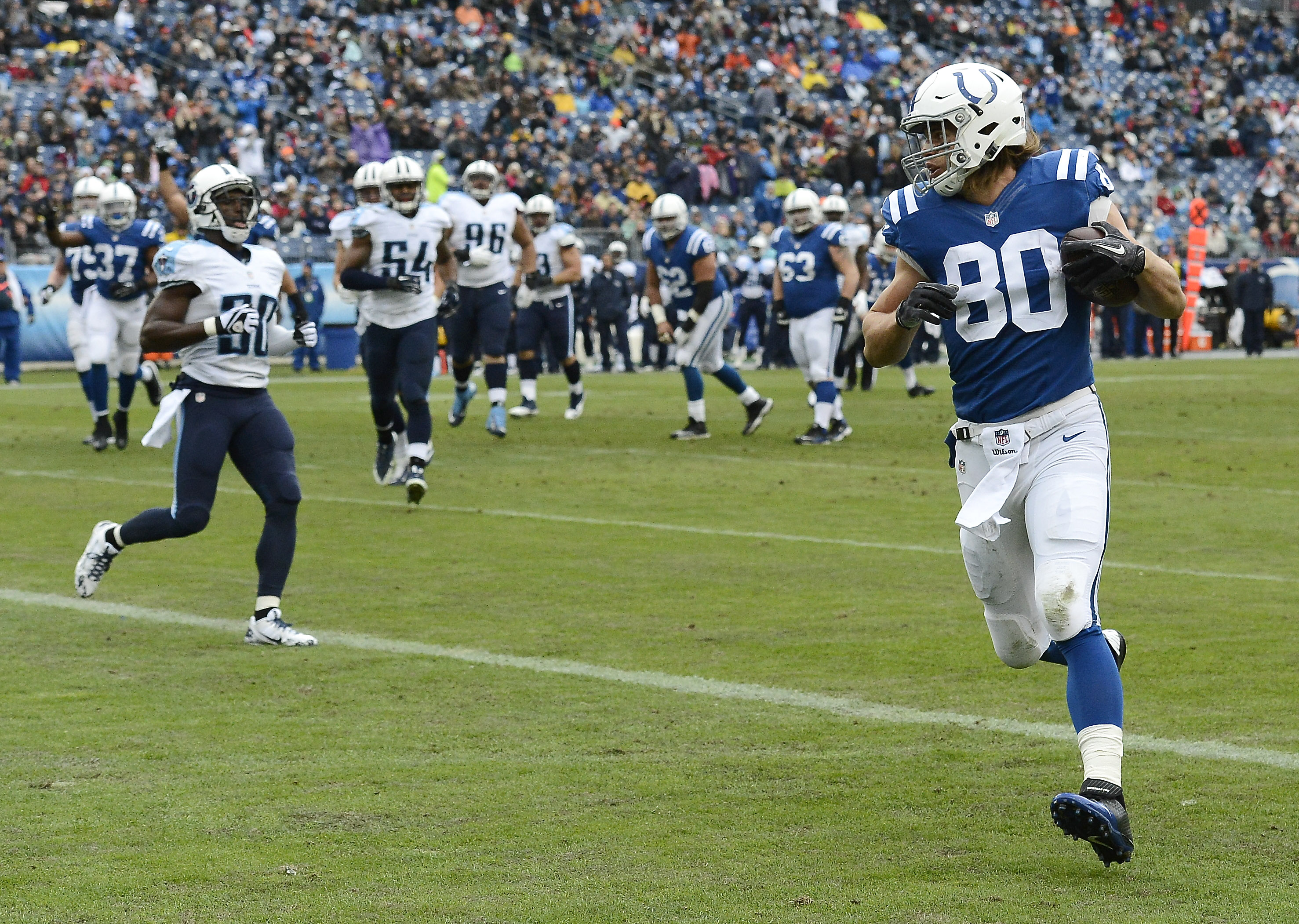 Colts finish AFC South sweep, beat Titans 27-10