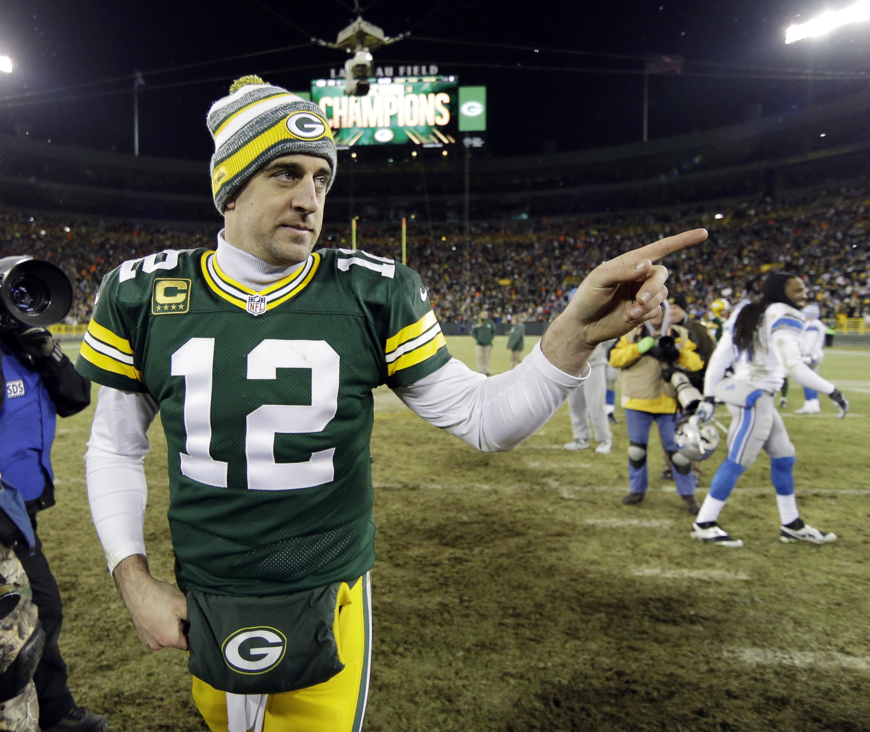 Packers, Rodgers beat Lions 30-20 to win NFC North