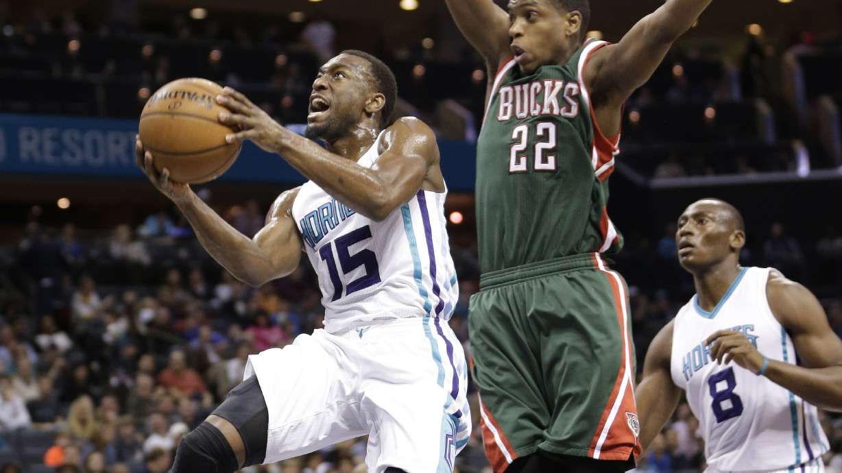 Knight helps lead Bucks over Hornets 104-94 in OT