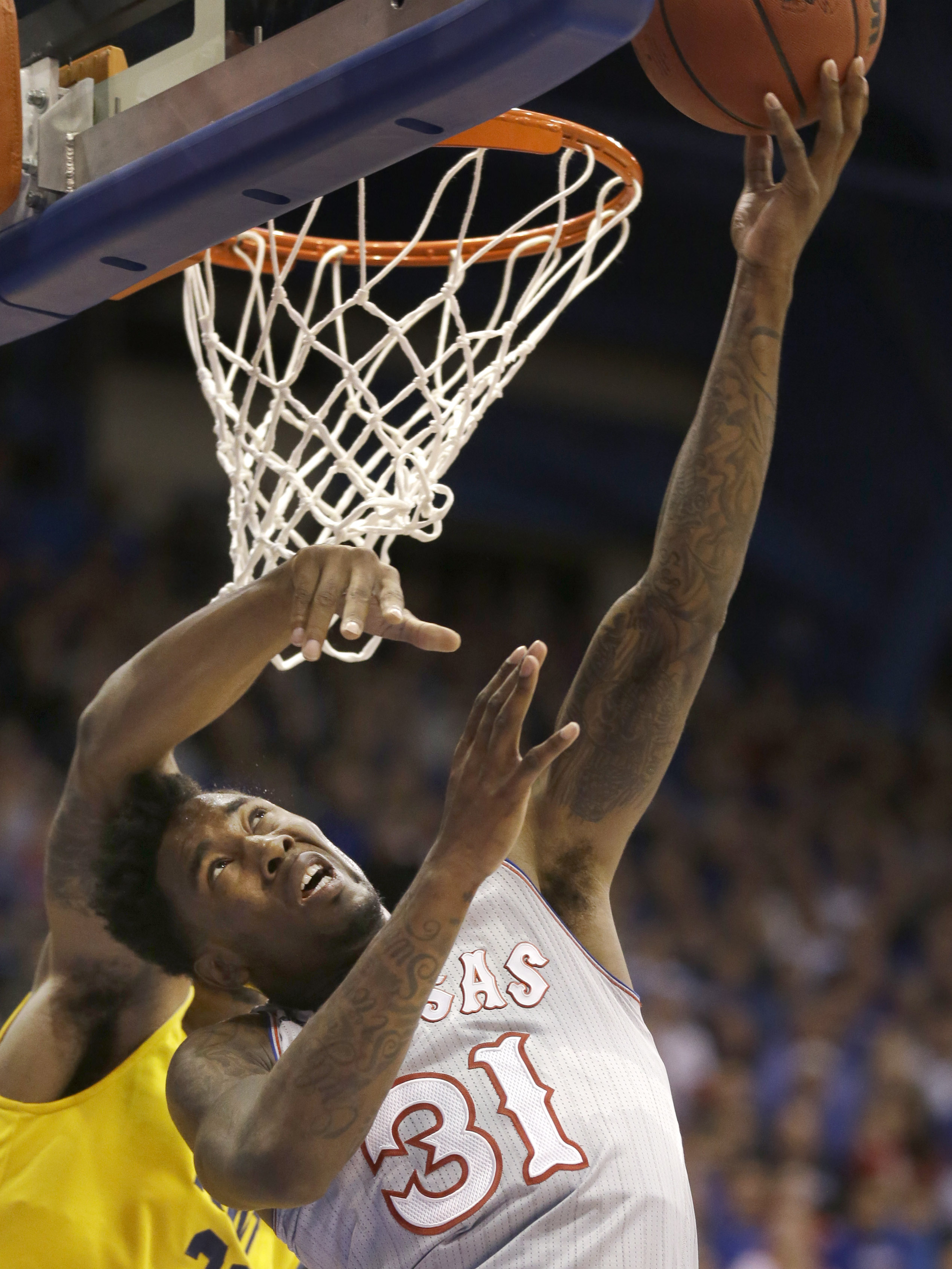 Oubre Jr. helps No. 13 Kansas beat Kent State 78-62