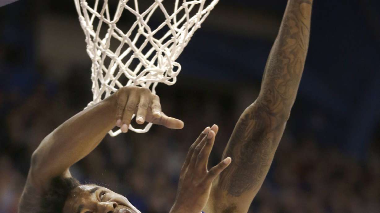 Oubre Jr. helps No. 13 Kansas beat Kent State 78-62