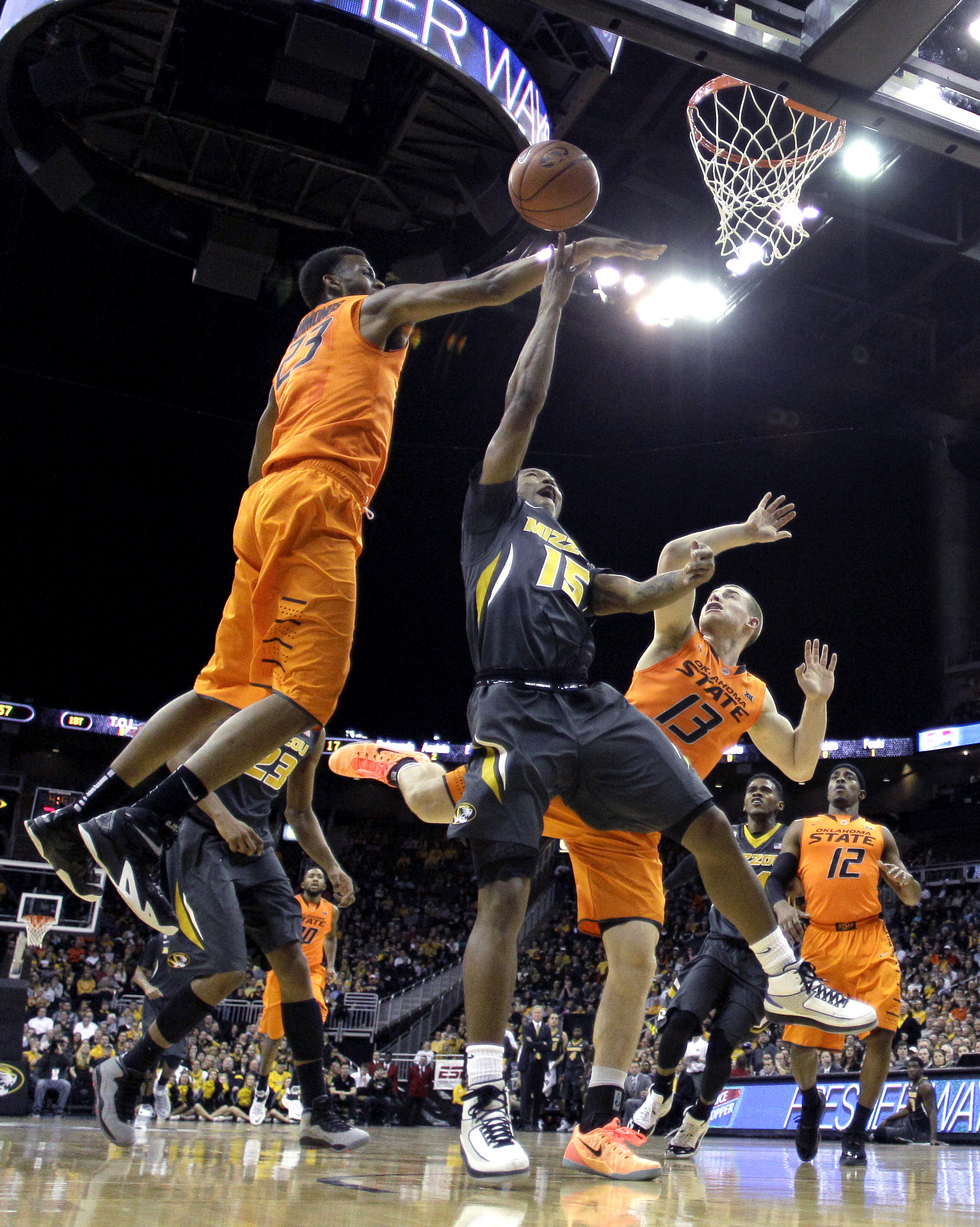 Oklahoma State holds off Missouri, 74-72 in OT