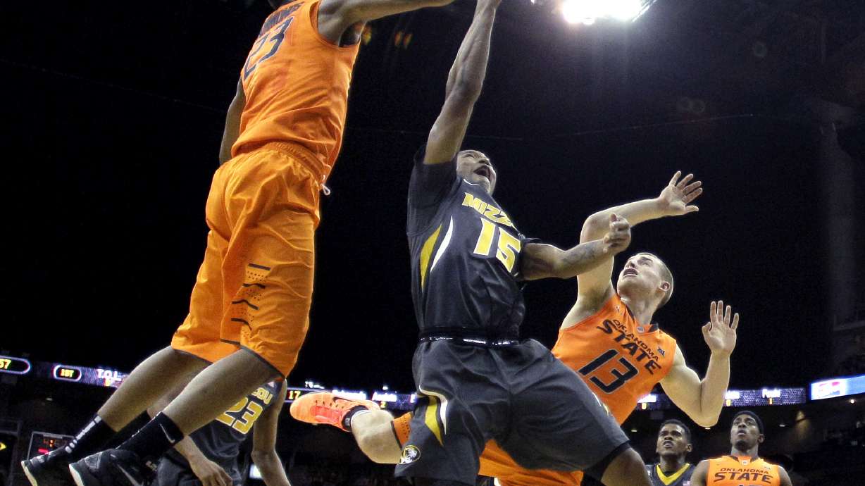 Oklahoma State holds off Missouri, 74-72 in OT