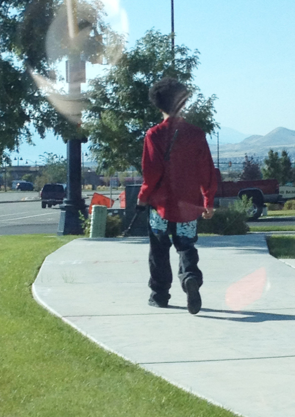 Darrien Hunt carrying his samurai sword just moments before he was shot and killed by police.