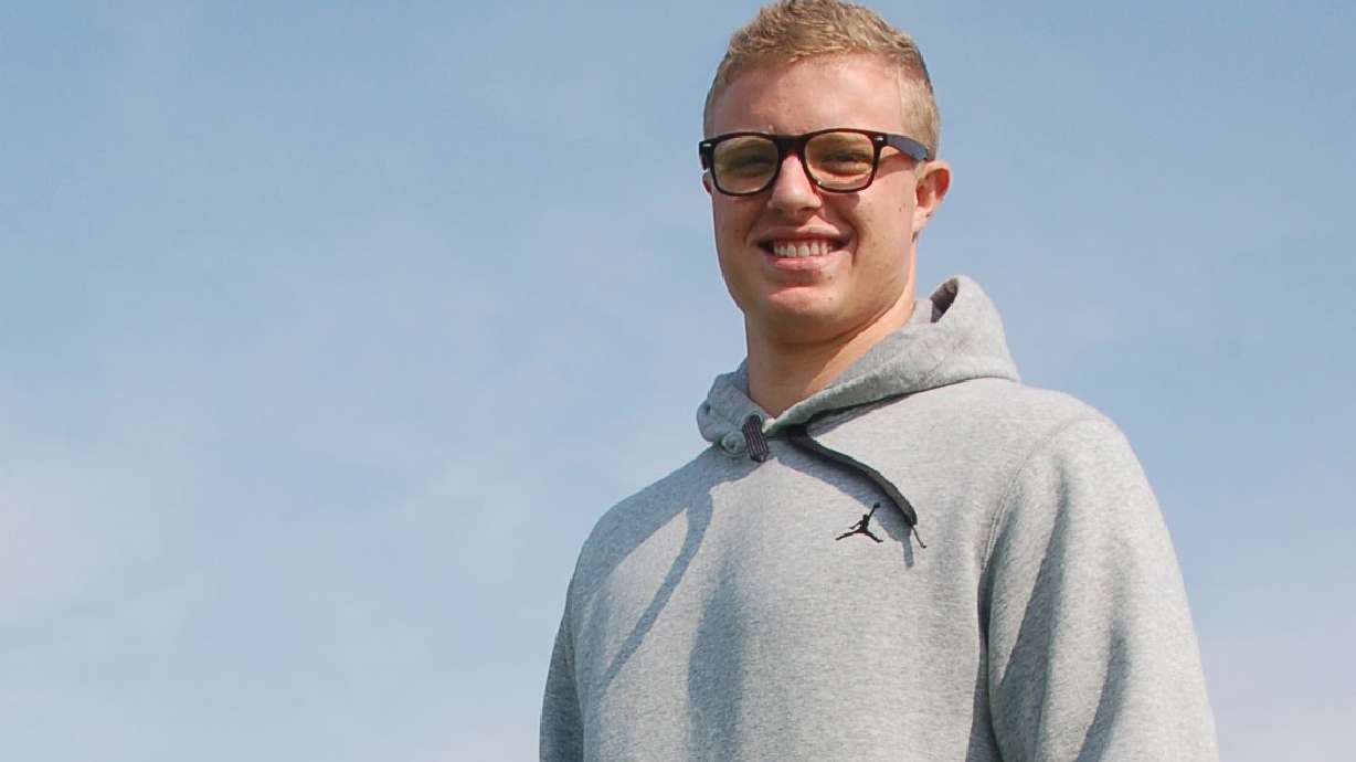 Ex-college football player charged with stalking mogul