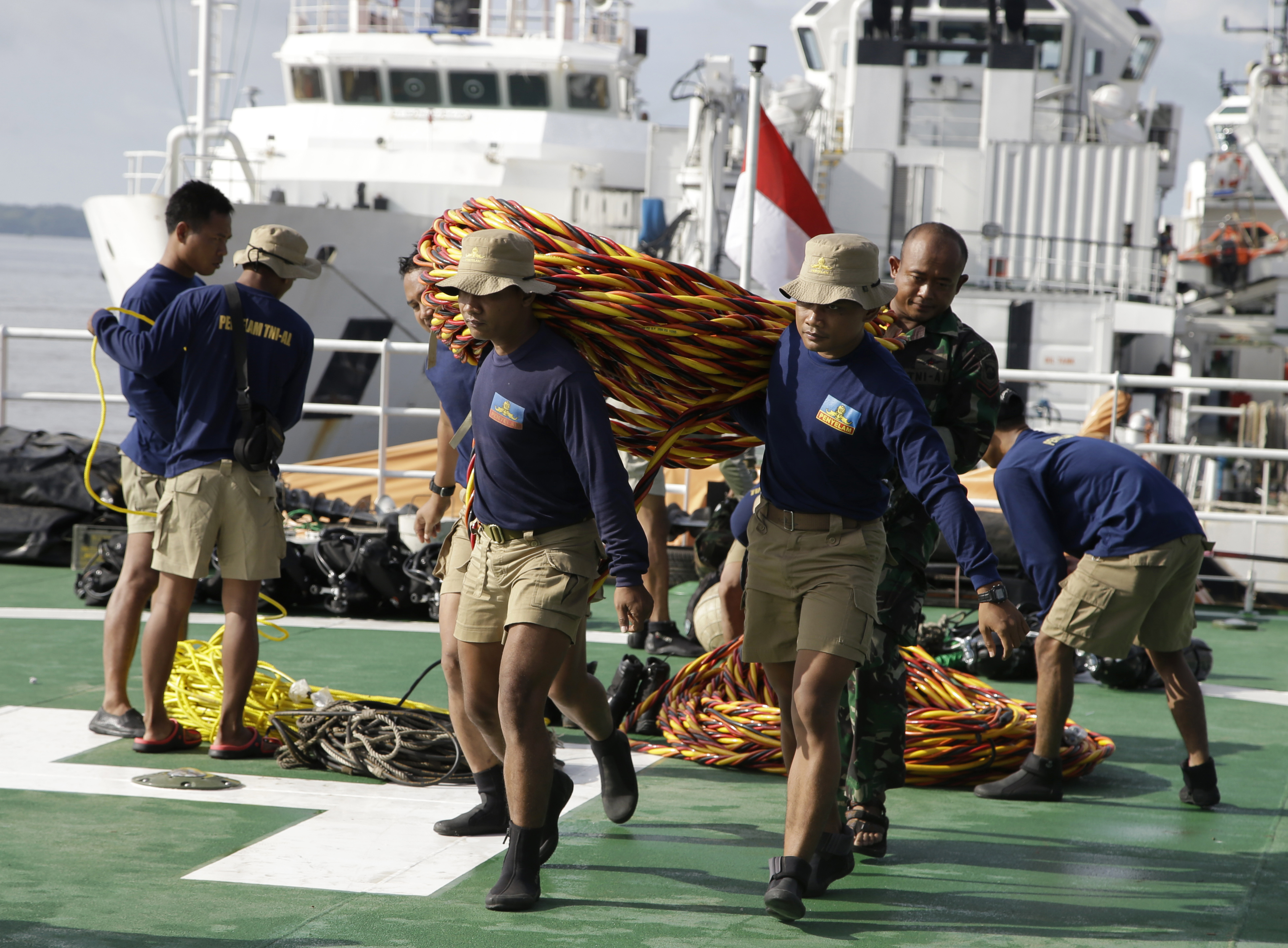 "It's possible the bodies are in the fuselage. So it's a race now against time and weather." -Vice Air Marshal Sunarbowo Sandi. (AP Photo/Achmad Ibrahim)