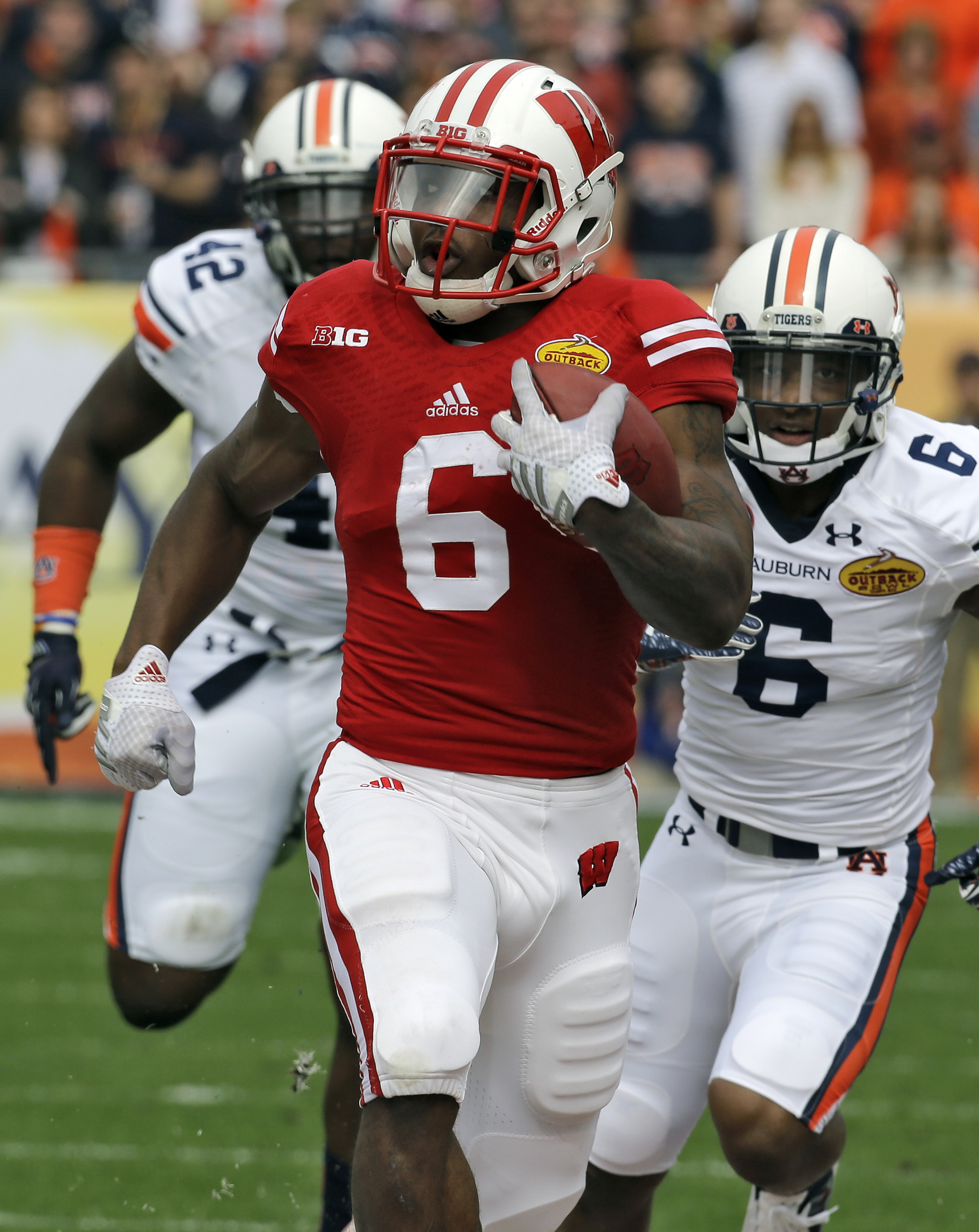 Muschamp gets close look in Auburn's 34-31 loss to Wisconsin