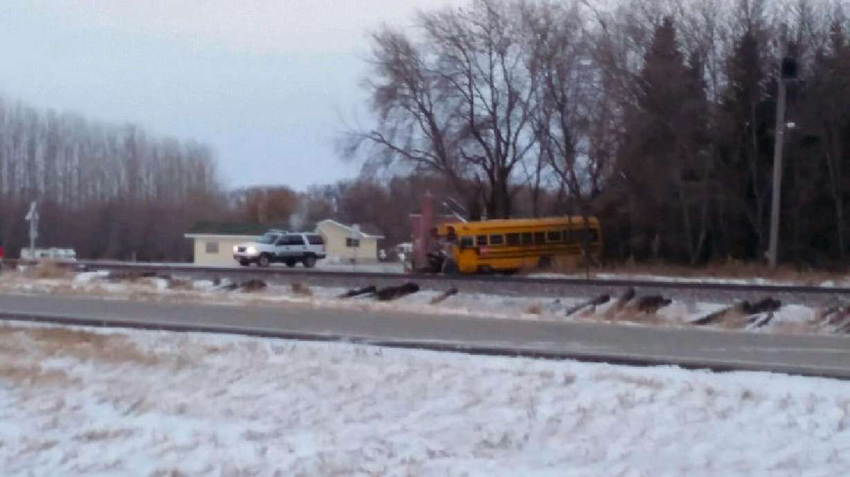 2 dead, a dozen injured in North Dakota train-bus crash