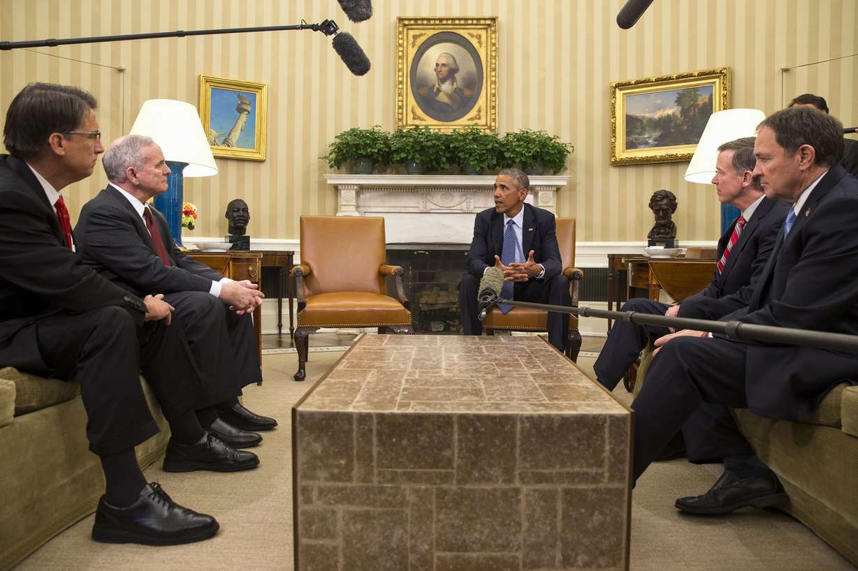 President Barack Obama meets with the executive committee of the National Governors Association, Tuesday, Jan. 6, 2015, in the Oval Office of the White House in Washington. From left are, North Carolina Gov. Pat McCrory, Minnesota Gov. Mark Dayton, Obama, National Governors Association Chairman, Colorado Gov. John Hickenlooper, and National Governors Association Vice Chairman Utah Gov. Gary Herbert. (Photo: Evan Vucci, Associated Press)