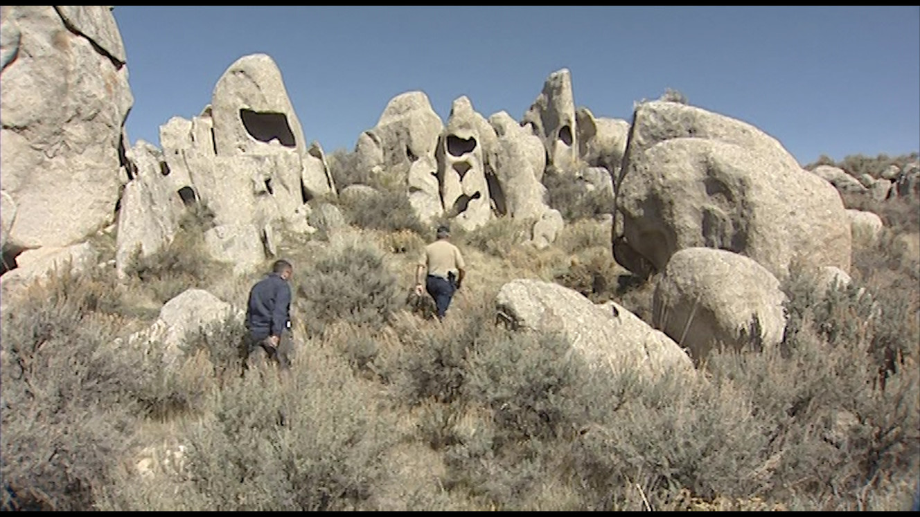 Box Elder County Sheriff Lynn Yeates takes KSL reporter Alex Cabrero on a tour of some rock formations in western Box Elder County. (Photo: Jay Dortzbach, KSL)