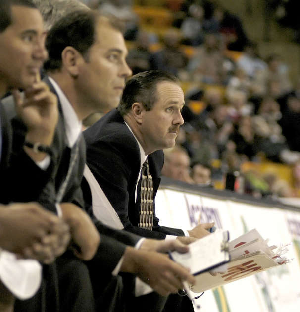 Utah State assistants Tim Duryea (center) and Don Verlin (right) were both assistant coaches under Stew Morrill. (Photo: Ryan Talbot, Utah State Athletic Media Relations/File)