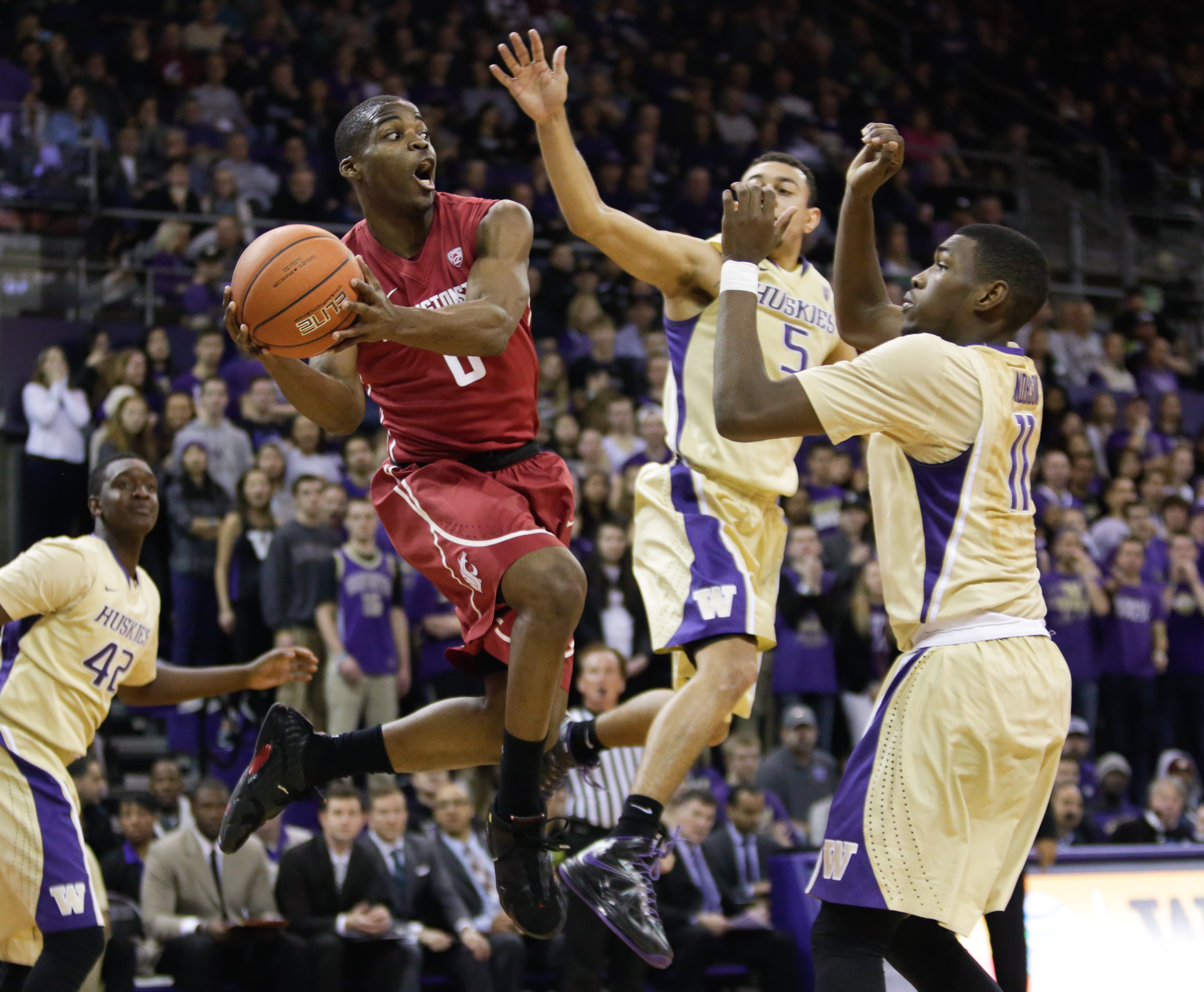 Washington State holds off late Washington surge, 80-77