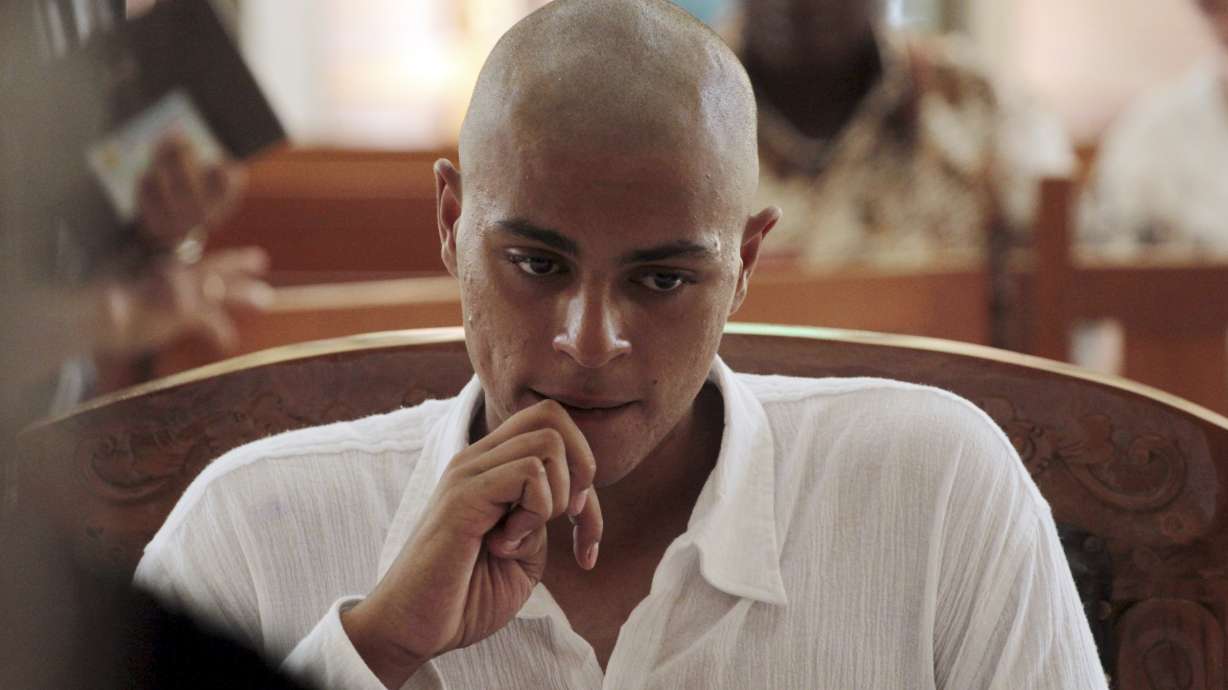 Trials of US couple charged with murder begin in Indonesia