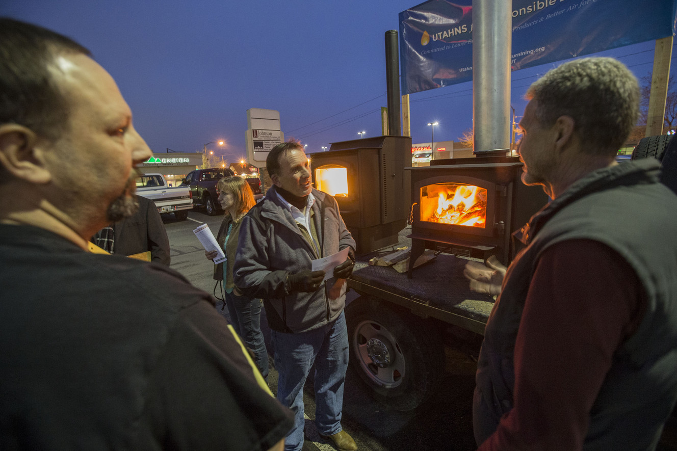 Randy Toupin, center, talks with Bill Hesford, left, and Dale Bennion Wednesday, Jan. 14, 2015, following a meeting at the Tooele County Health Department, talking about the proposed burn ban. (Photo: Scott G Winterton, Deseret News)