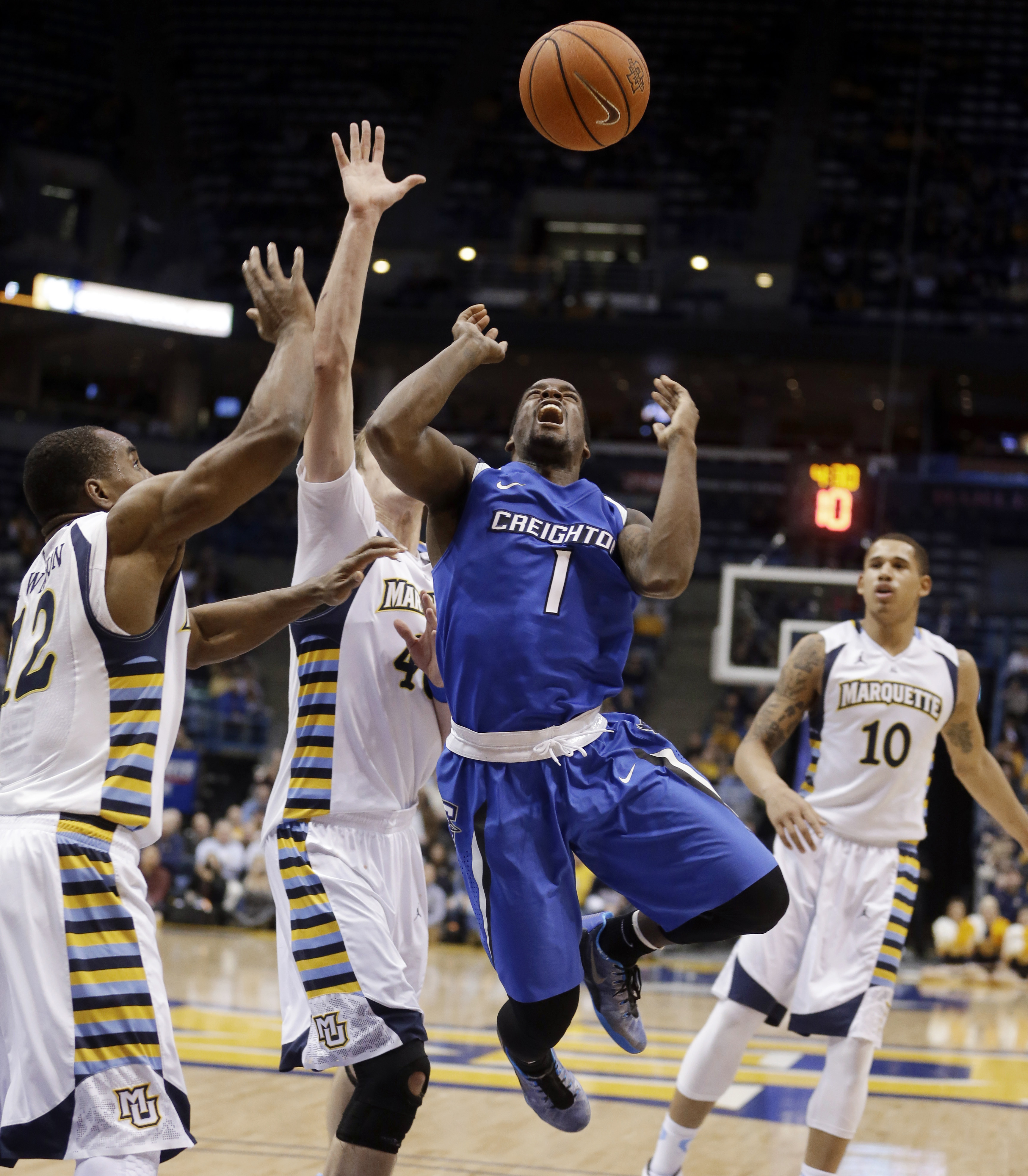 Carlino's 3 helps Marquette beat Creighton 53-52